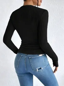Rear perspective showing texture of women's black ribbed long sleeve crew neck T-shirt