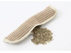 Close-up detail of a durable jute catnip pillow with dried herb filling for pet cats
