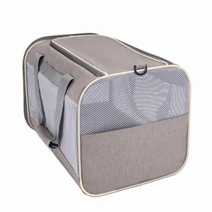 Bolsa de transporte profesional gris y transpirable para mascotas con paneles de red