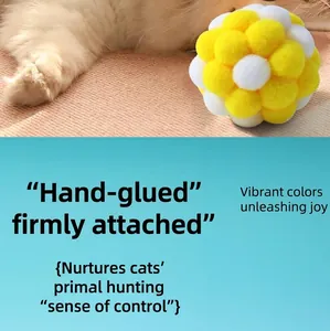Close-up of vibrant yellow and white plush toy ball showing soft texture for pet cats