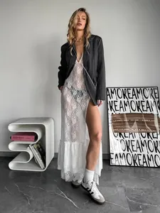 Detailed visual of a sexy white sheer floral lace V-neck camisole maxi dress with high slit