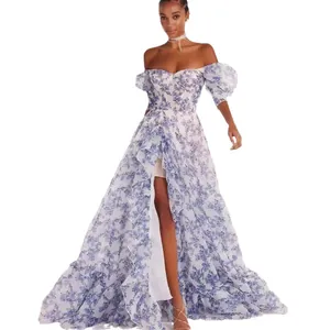 Elegant floral organza off-shoulder evening gown with a high slit and layered ruffles.
