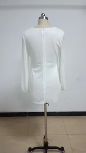 Back view of elegant white sequin bodycon dress with lantern sleeves and round neck detail