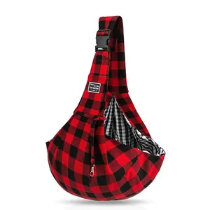 Red and black buffalo plaid pet sling carrier bag with adjustable strap and buckle