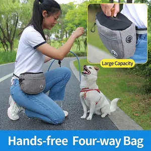 Grey pet training treat pouch worn as a waist bag for outdoor dog training