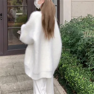 Back view of a loose white faux mink fur oversized cardigan for women's autumn style