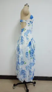 Side view detail of elegant blue floral print chiffon long evening dress on mannequin