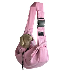 Breathable pink pet carrier sling bag with adjustable buckle and side pocket