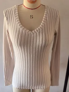 Detailed view of beige V-neck ribbed t-shirt showing soft brushed knit texture
