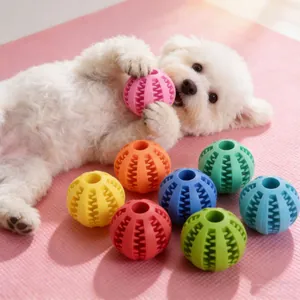 Detail view of colorful TPR dog toy balls for teeth cleaning and treat dispensing