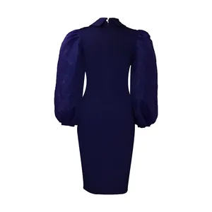 Detailed back view of a sophisticated navy blue pencil dress featuring sheer mesh lantern sleeves