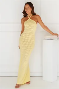 Pale yellow halter-neck crochet maxi dress beach cover-up with diamond pattern