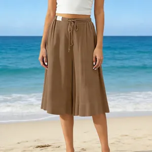 Detailed view of comfortable brown wide-leg beach culottes with an elastic drawstring waist