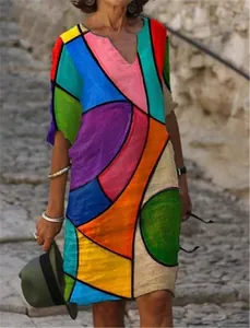 Artsy colorful geometric print linen dress with loose fit and short sleeves