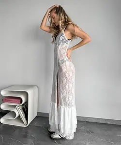 Full-length view of a sexy white sheer lace maxi dress with V-neck and high slit.