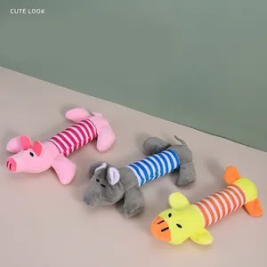 Detail view of squeaky plush dog toys featuring striped pig and duck designs
