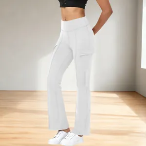 Close-up detail view of white high-waisted cargo yoga flare pants with a functional side pocket