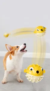 Interactive yellow pufferfish dog toy for dental cleaning and fetching play indoors
