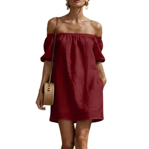 Close-up detail of a dark red off-shoulder cotton linen summer mini dress in a loose fit