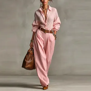 Elegant pink long-sleeve button-down shirt and high-waisted wide-leg trousers two-piece set