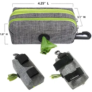 Dimensions of gray pet poop bag dispenser with green zipper and clip