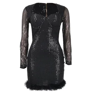 Macro view of black long-sleeve sequined mini dress featuring fuzzy feather trim