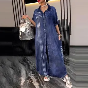 Detail view of denim shirt dress with letter print and lapel collar
