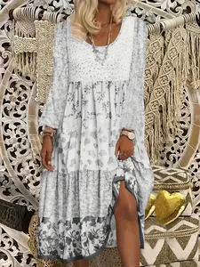 Detailed shot of a bohemian long-sleeved floral print maxi dress for women in light tones