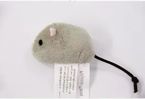 Detailed close-up of a grey plush mouse cat toy with its fabric material tag