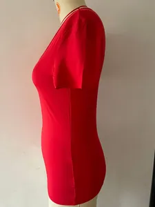 Side view of a red slim fit short sleeve T-shirt for women on a mannequin