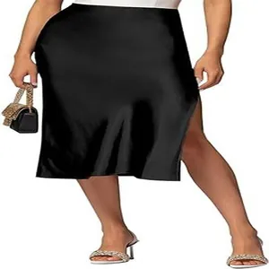 Detailed view of black satin midi skirt featuring side slit and high waist design