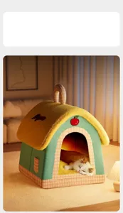 Cozy plush house-shaped pet bed with a cute kitten resting inside comfortably.
