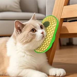 Close-up detail of avocado cat face scratcher featuring honeycomb texture and catnip ball.
