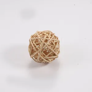 Natural hand-woven rattan ball toy for parrots and small birds on a clean white background