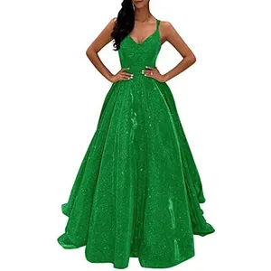 Elegant green sparkling floor-length evening gown with V-neck and spaghetti straps. Perfect for gala.