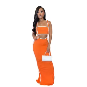 Trendy orange two-piece set featuring a strap crop top and bodycon maxi skirt for women