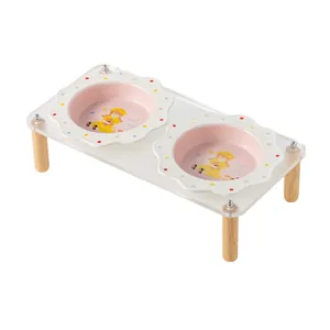 Polka dot girl series flower-shaped ceramic pet bowl with clear acrylic stand and wooden legs.