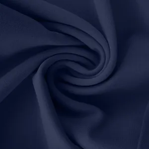 High-quality close-up of navy blue elastic fabric showing soft texture for yoga pants