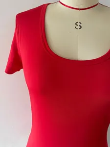 Detail shot of red low scoop neck short sleeve slim fit T-shirt on a mannequin.