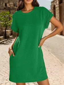 Casual green round neck short sleeve dress with rolled cuffs and side pockets