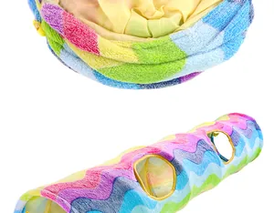 Detail view of a foldable rainbow cat tunnel showing crinkle paper texture and play holes.