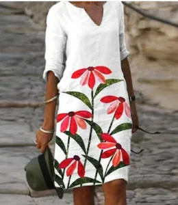 Elegant white V-neck mid-sleeve midi dress featuring a vibrant red floral print design