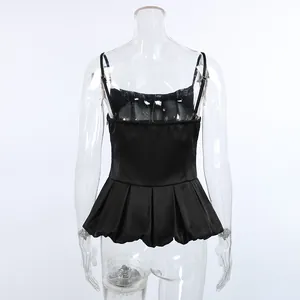 Back view of a sleek black satin sleeveless camisole top with elegant pleated peplum hem