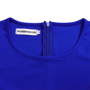 Detail of royal blue neckline featuring back zipper and METAMORPHOSIS GIRL brand label