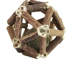 Macro view of a Matatabi wooden ball containing a catnip sphere for cat teething