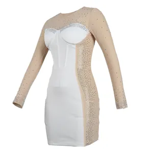 Detail view of long sleeve bodycon dress with sheer mesh and silver rhinestone decor