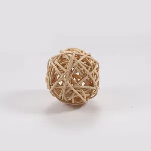 Natural woven rattan ball foot toy for parrots and pet birds in light wood finish