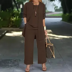 Women's 3-piece solid color casual suit with cardigan, tank top, and long pants.