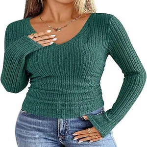 Detailed texture view of women's green ribbed slim fit V-neck long sleeve T-shirt.