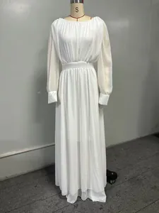 Detail view of a French style white double-layer chiffon maxi dress on a mannequin